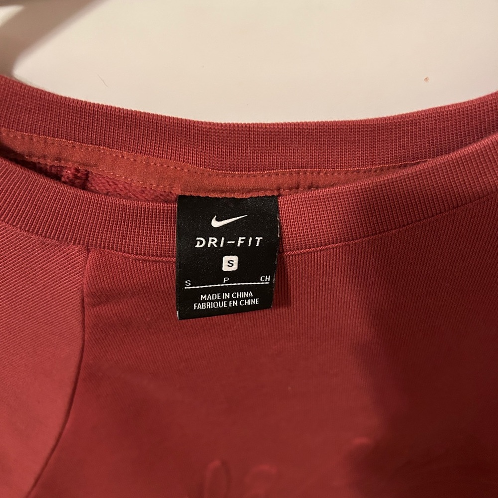Size small Nike crew neck. Brunt Orange color.